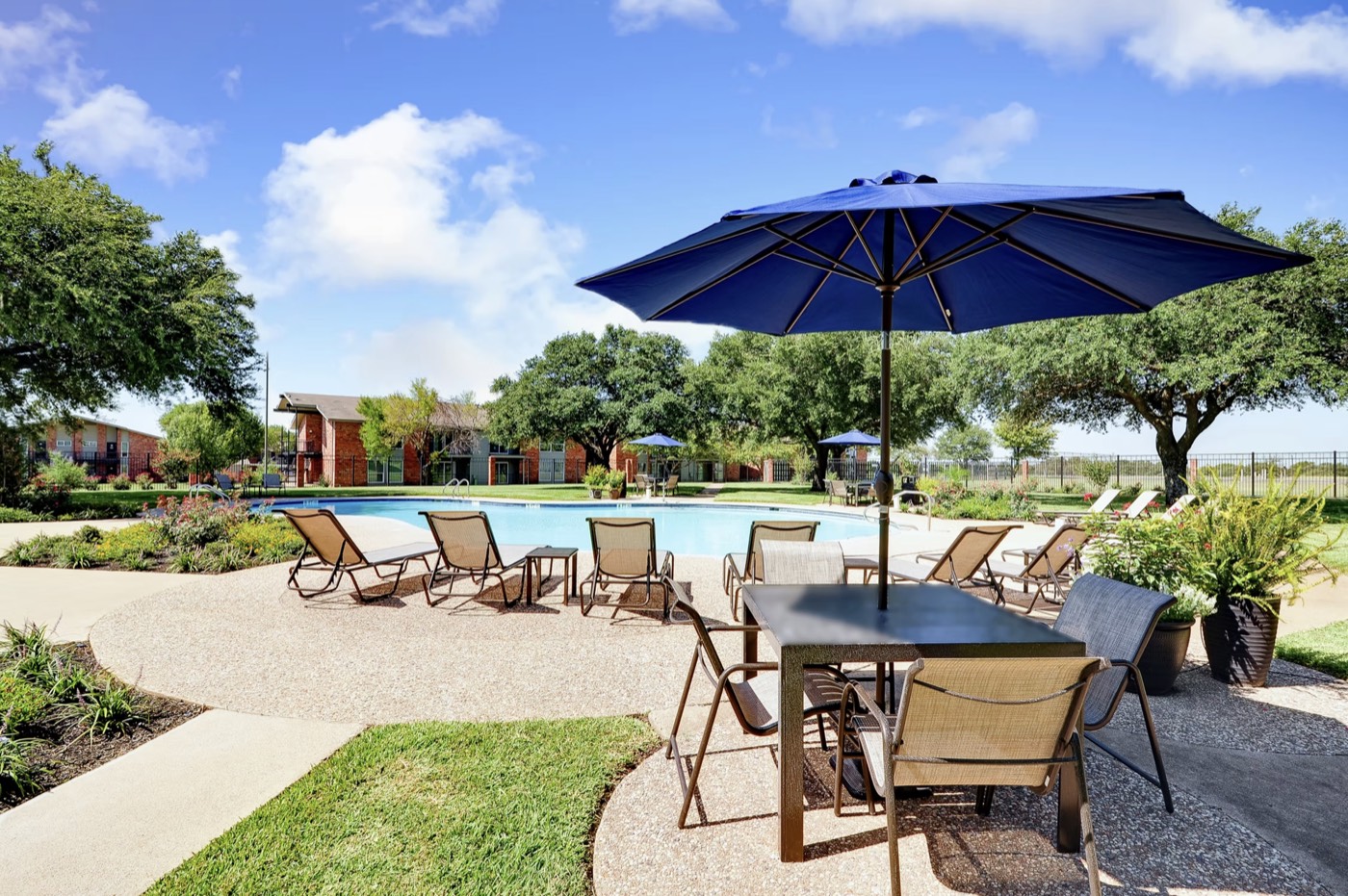 Pool and outdoor amenities at The Midtown Apartments in Temple, Texas